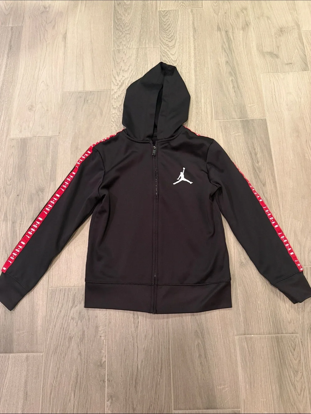 Jordan Boys Black Zip Up Hoodie with Red Sleeve Design Size S